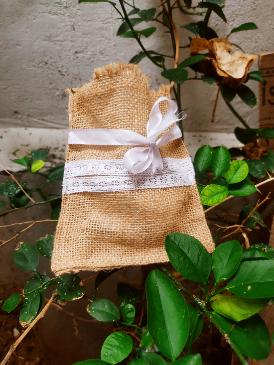 White border Jute Potli