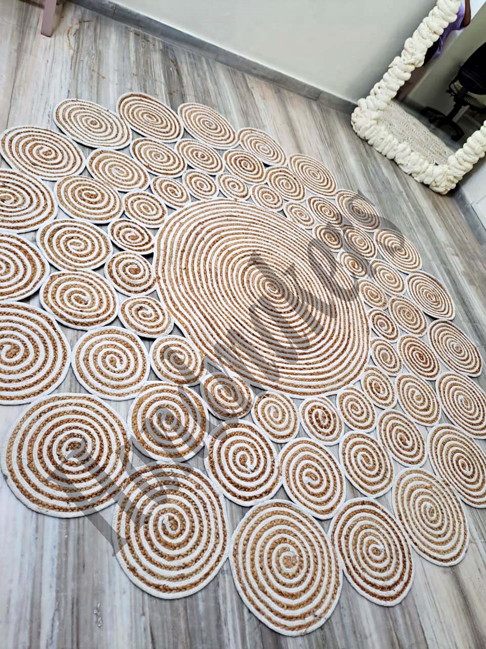 white & beige jute braided rug