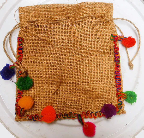 "Exquisite Elegance: The Splendor of Embroidered Luxury Potli Clutch Bags in Agra"