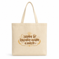 Natural canvas tote bag featuring the Sanskrit motivational quote "उद्यमेन हि सिद्ध्यन्ति कार्याणि न मनोरथैः" in elegant gold calligraphy with decorative accents on a minimalist background. 